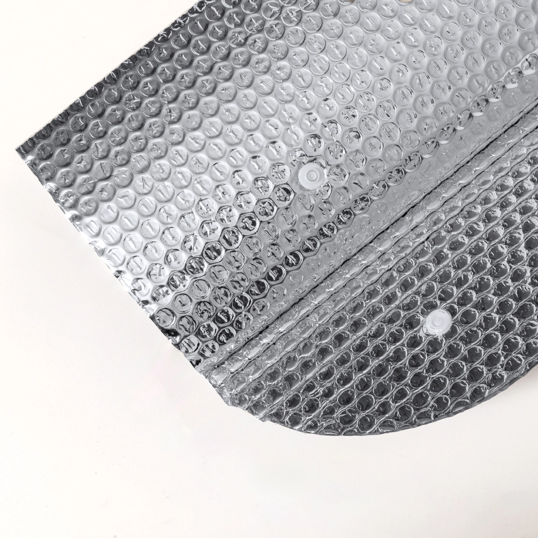 Immagine Parasole da auto in alluminio con bolle su entrambi i lati e dimensioni 130x70 cm.- Parasole Harmuny