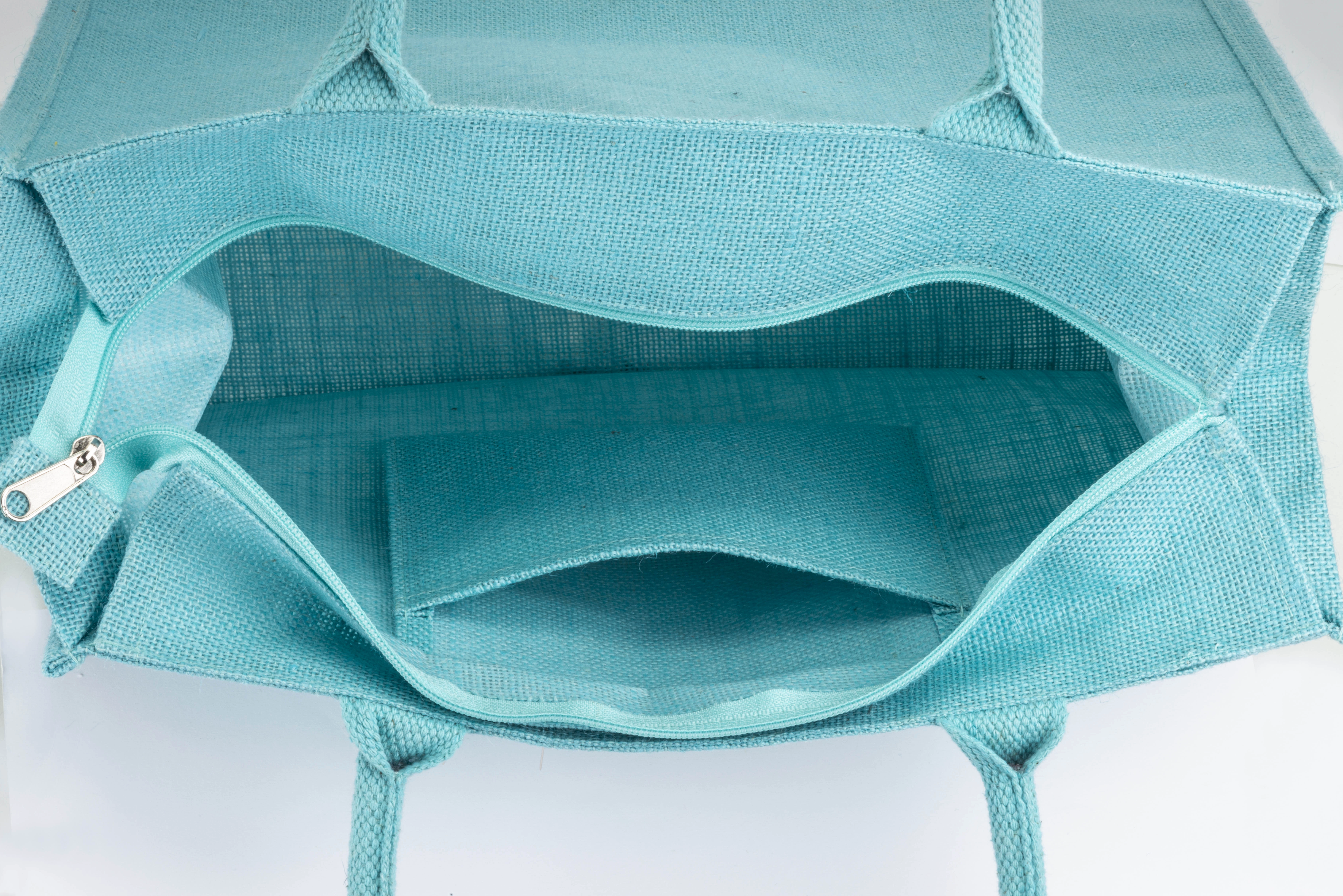 Immagine Borsa in juta con manici in cotone. Dotata di chiusura a zip