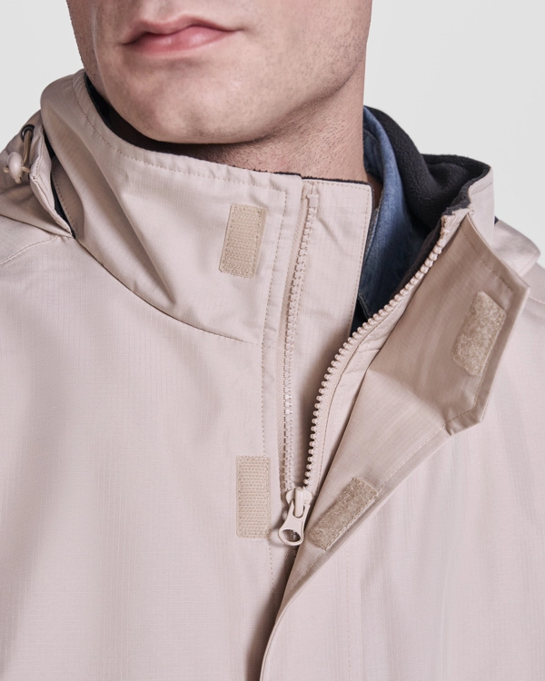 Immagine Parka imbottito impermeabile. Collo alto con cappuccio ripiegabile e chiusura a velcro - AMERICA