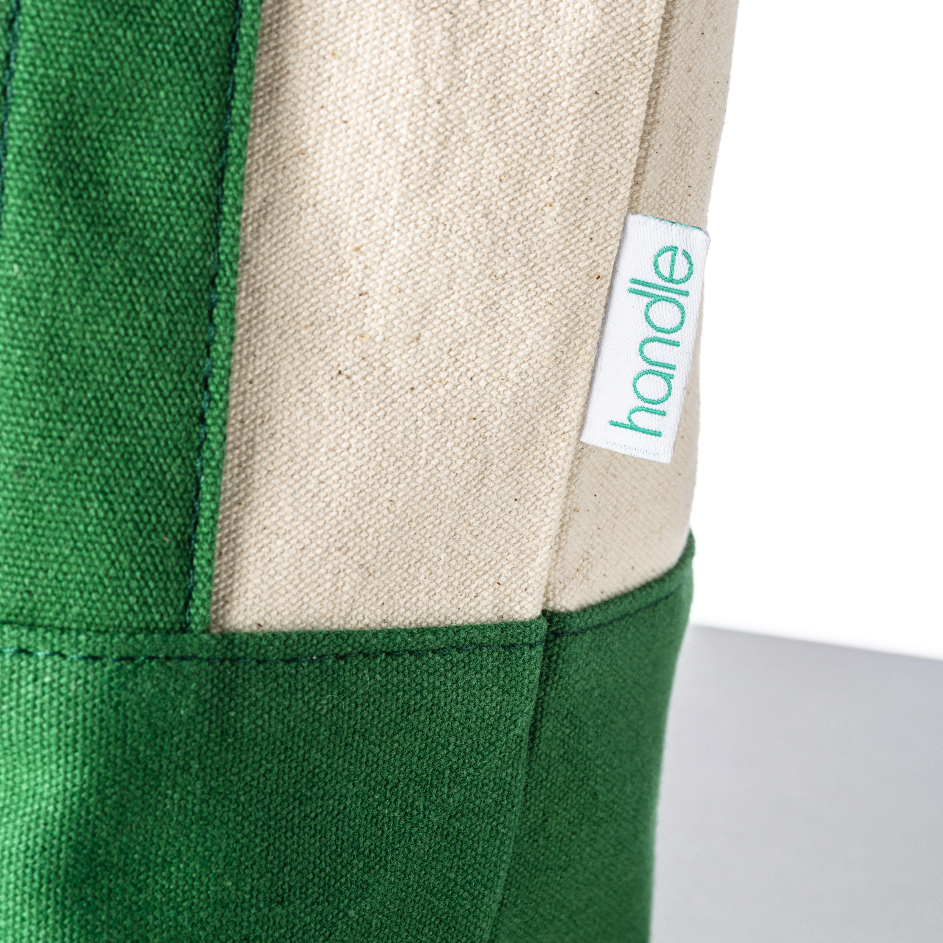 Immagine Mini borsa shopper in cotone riciclato da 340 g/m2 con manici e base colorati. GRS