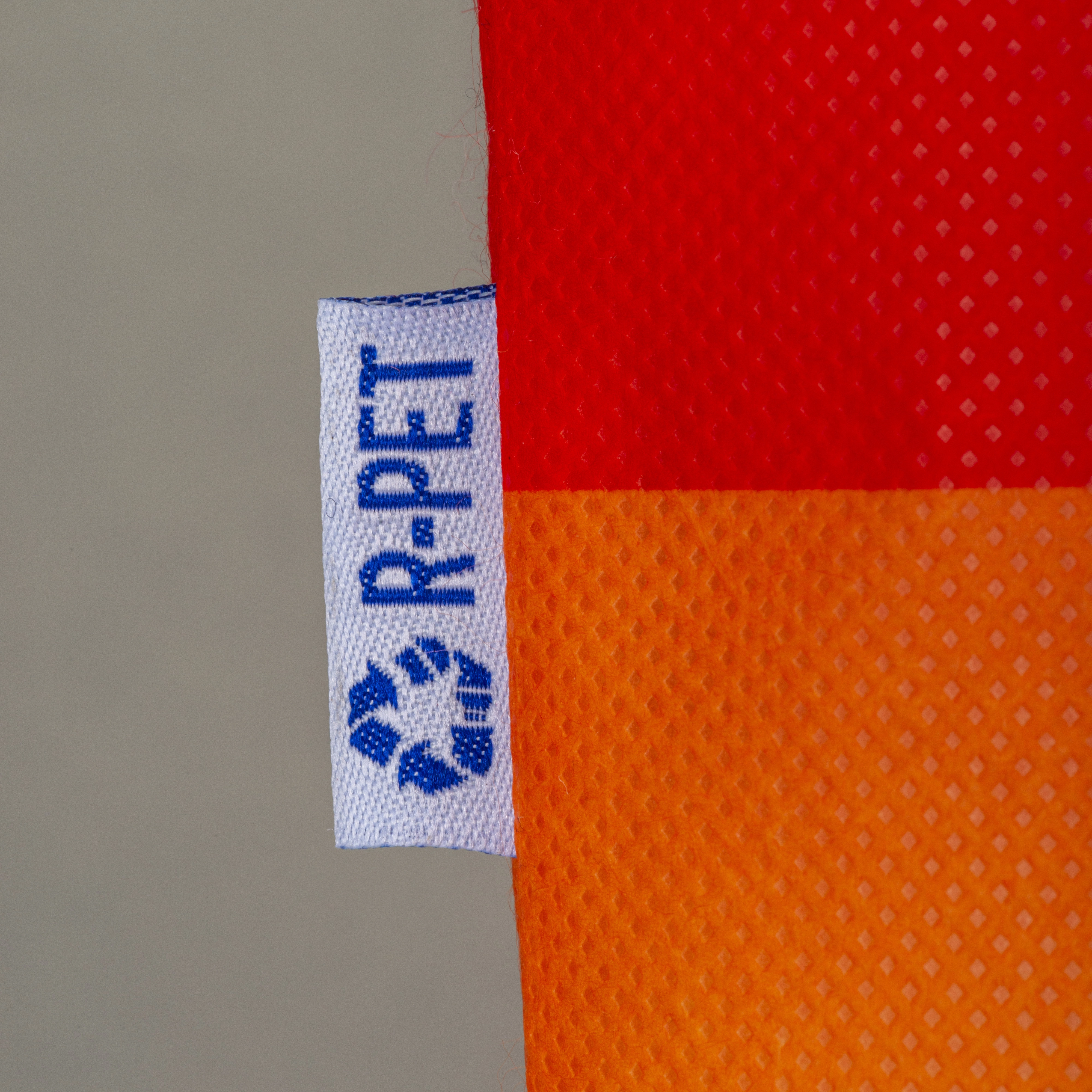 Immagine Shopper arcobaleno in R-pet 80g/m2, manici lunghi