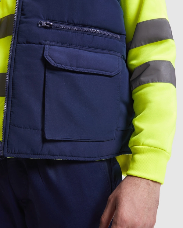 Immagine PERSEI - Gilet reversibile multitasche alta visibilità con collo alto.