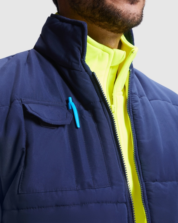 Immagine PERSEI - Gilet reversibile multitasche alta visibilità con collo alto.