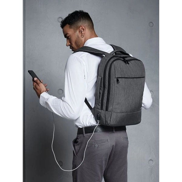 q-tech-charge-convertible-backpack-2.webp